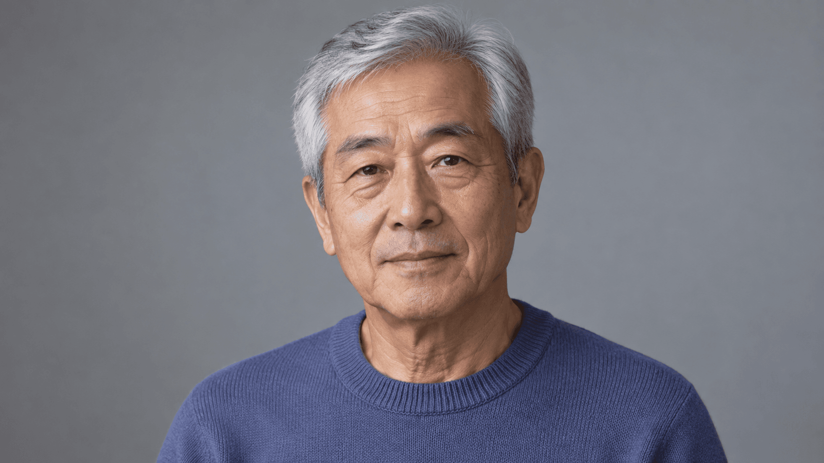 Older fictional portrait concept with silver hair and a relaxed expression