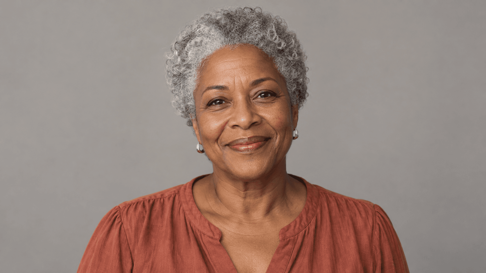 Fictional studio portrait reference with natural expression lines