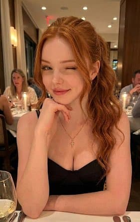 Profile / Avatar - Realistic portrait of a young woman winking in an upscale restaurant — output