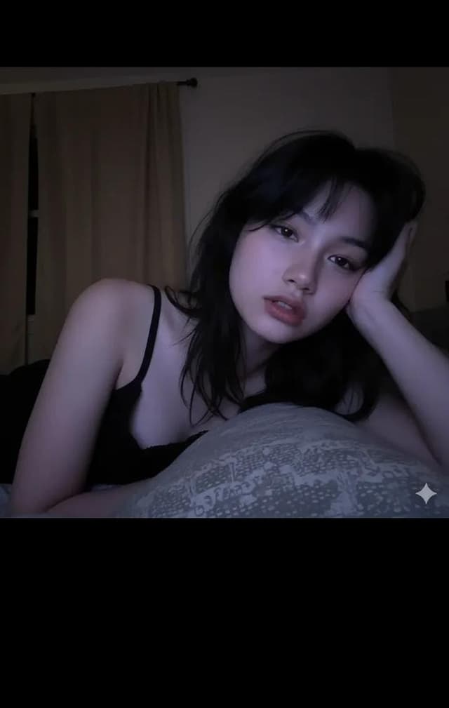 Profile / Avatar - Realistic Low-Light Phone Selfie (Screen Glow) — output