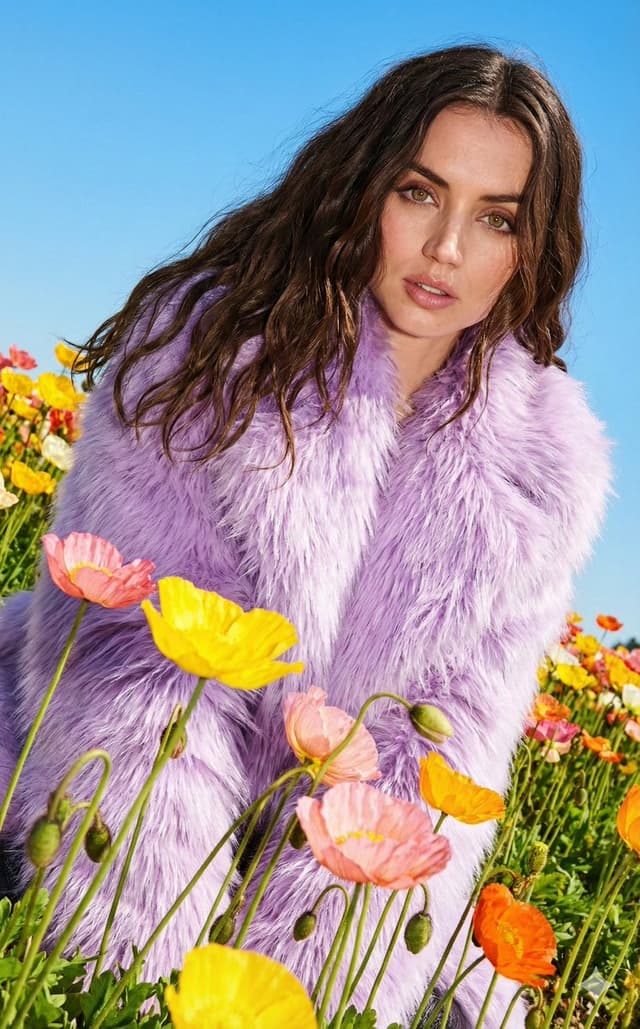 Purple faux fur fashion portrait with harsh flash prompt — output