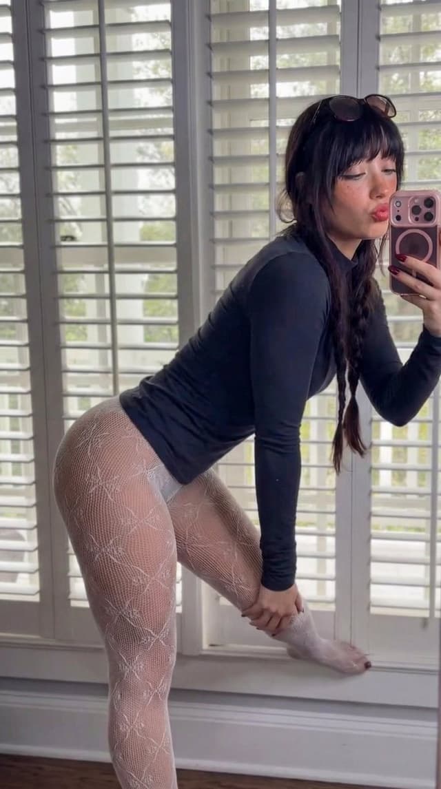 Photorealistic Side-Angle Mirror Selfie with Backlighting — output