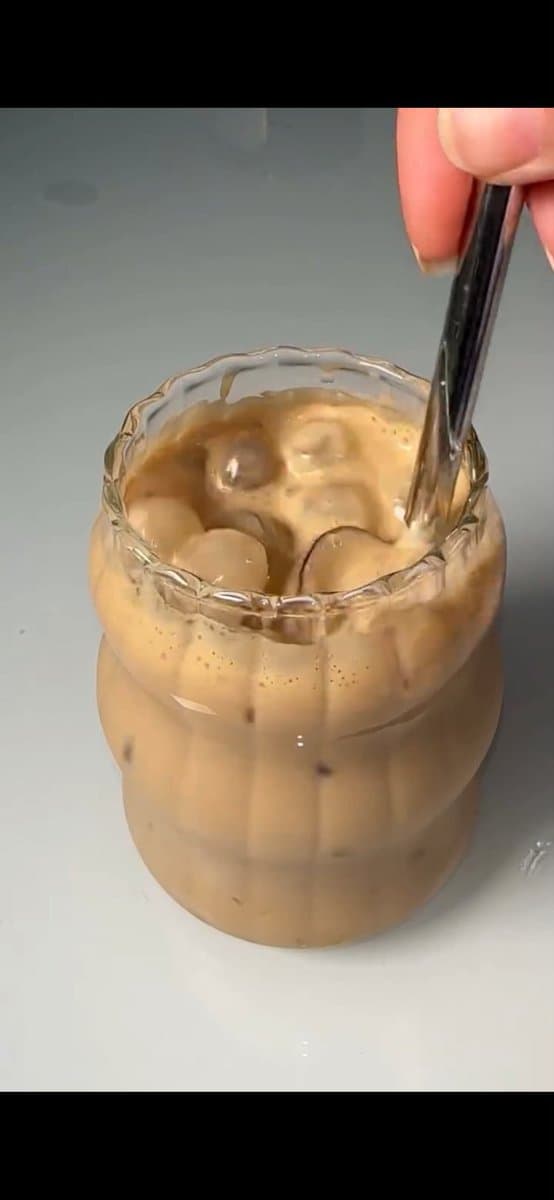 E-commerce Main Image - Stirred Iced Honey Latte Close-Up — output