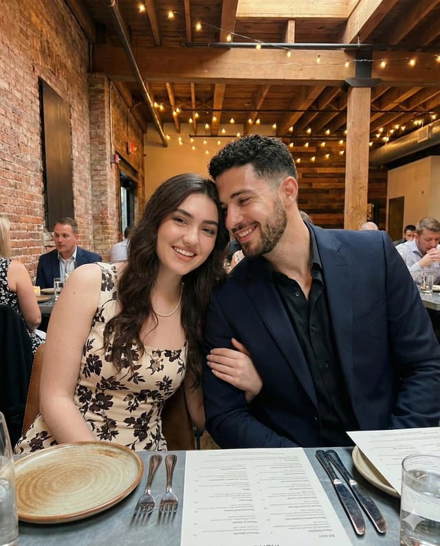 Intimate Portrait of a Couple in an Upscale Restaurant — output